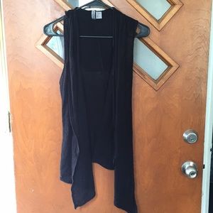 Sleeveless cover up. Never worn